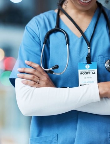 doctor-arms-crossed-and-stethoscope-for-healthcar